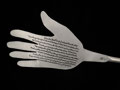 Gracias hand, steel, acrylic paint, closeup
